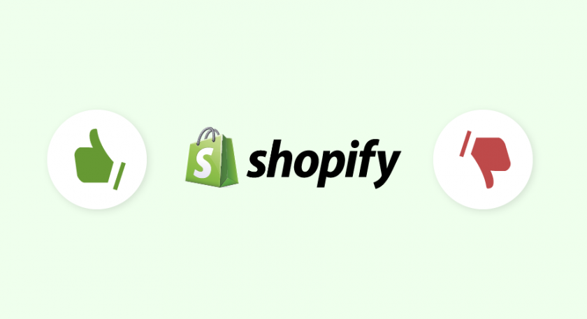 Two thumbs, one point up and one down are on either side of the Shopify logo